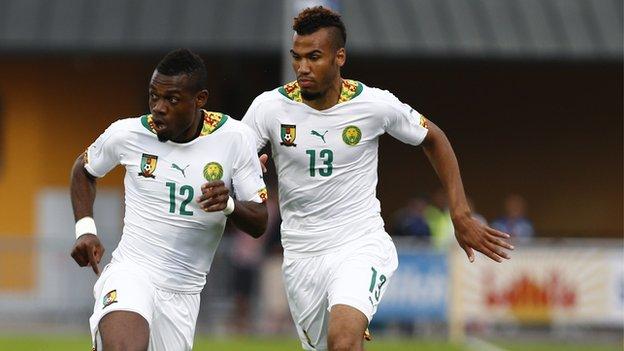 Cameroon forward Eric Maxim Choupo-Moting (right) and defender Henri Bedimo