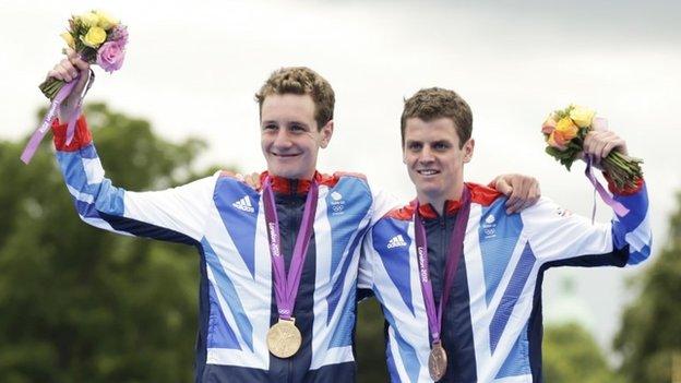 Alistair (left) and Jonny Brownlee celebrate their gold and bronze medals at the London 2012 Olympics