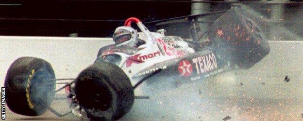 Mario Andretti crashes during the Indy 500 in 1992