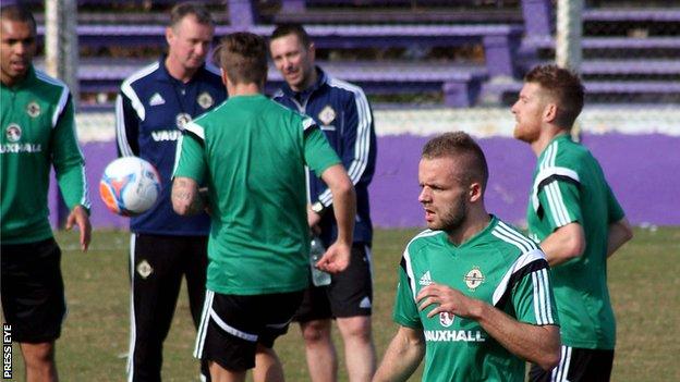 Ryan McLaughlin [second from the right] trains with the Northern Ireland squad in Montevideo