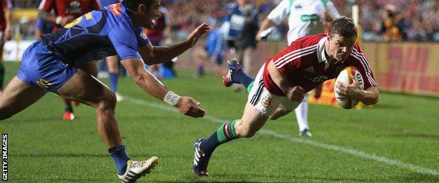 Brian O'Driscoll dives over for the Lions during their 2013 tour