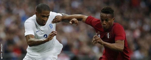 Glen Johnson competes for the ball