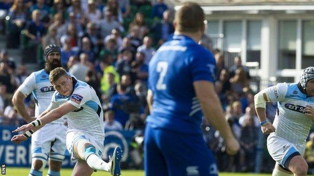 Finn Russell scores with the boot to give Glasgow an early lead