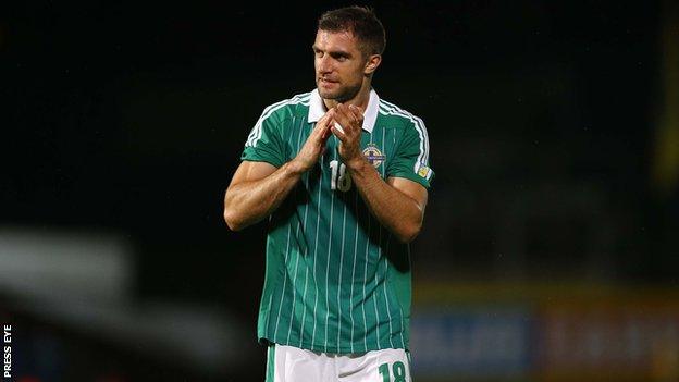 Aaron Hughes hopes to resolve his future after international duty