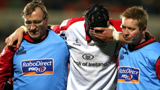 A distraught Stephen Ferris is helped off the pitch at Ravenhill after being injured during a Pro12 fixture against Edinburgh in November 2012