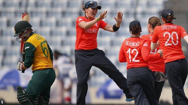 England celebrate a wicket against South Africa in the ICC Women's Twenty20 Cricket World Cup semi-final match in Dhaka, Bangladesh