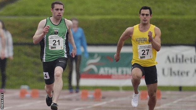 Jason Smyth [left] on the way to winning the 100m title at the Mary Peters Track