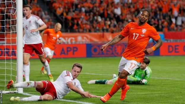 Jeremain Lens celebrates giving the Netherlands a 2-0 lead against Wales in Amsterdam.