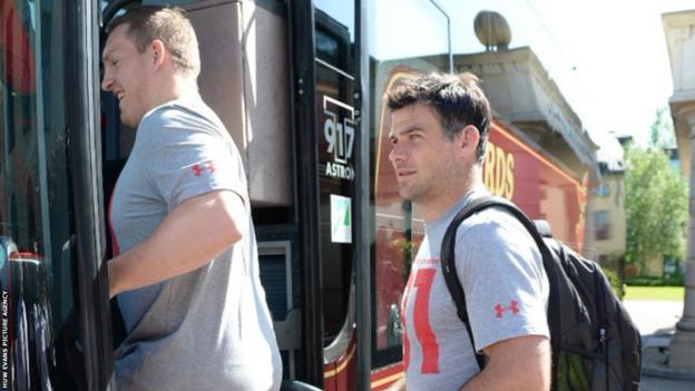 Gethin Jenkins and Mike Phillips board the Wales team coach as the squad leave their team hotel to head to South Africa.