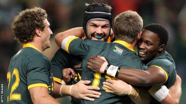 South Africa players celebrate a try in their victory over a World XV