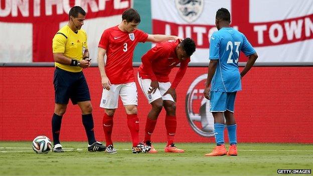 England striker Daniel Sturridge (second right) in pain during the 0-0 draw with Honduras