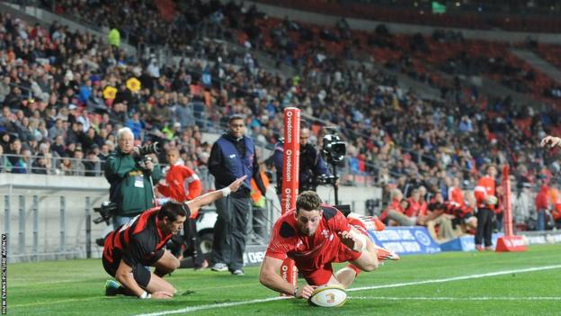 Alex Cuthbert scores Wales' fourth try in the victory over EP Kings in Port Elizabeth.