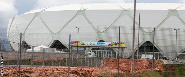 The area around Arena Amazonia shows work remains undone ahead of England's opening game.