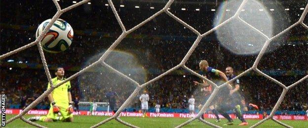 Netherlands forward Arjen Robben scores against Spain in his side's 5-1 win