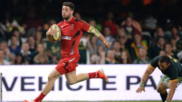 Alex Cuthbert runs in to score a memorable late consolation try for Wales.