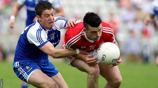 Gerard McCaffrey of Monaghan in action against Darren McCurry of Tyrone