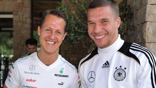 Michael Schumacher and Lukas Podolski
