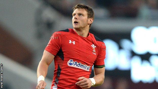 Dan Biggar of Wales watches his drop goal go through the posts
