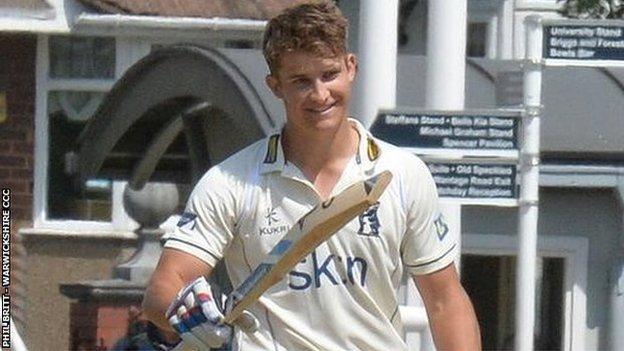 Warwickshire batsman Sam Hain celebrates his century at Wantage Road