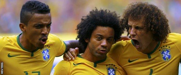 (left to right) Luiz Gustavo, Marcelo and David Luiz sing the national anthem