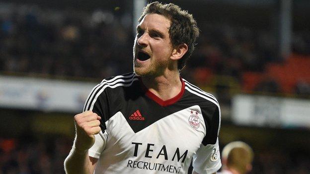 Scott Vernon celebrates one of his three goals for Aberdeen against Dundee United at Tannadice Park, May 2014