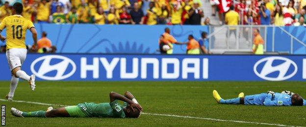 Ivory Coast are left dejected after letting in a second against Colombia's