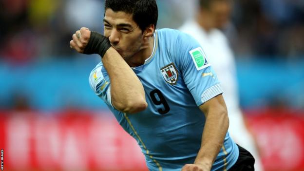 Uruguay striker Luis Suarez celebrates scoring against England
