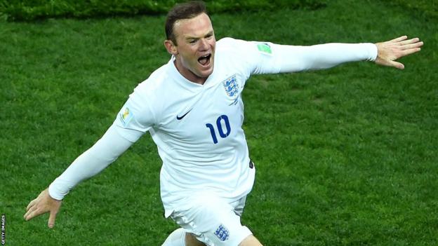 England striker Wayne Rooney celebrates equalising against Uruguay