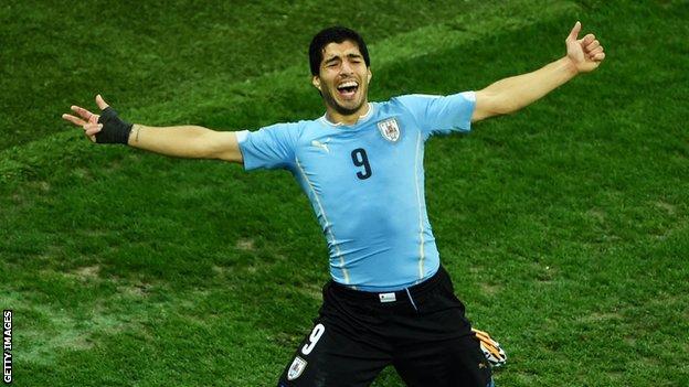Suarez celebrates his winning goal.