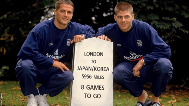 Michael Owen and Steven Gerrard pose during a photo shoot before the World Cup 2002 qualifying match against Germany held at Burnham Beeches Hotel