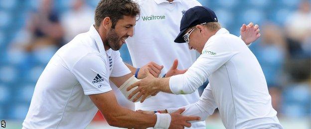 England's Liam Plunkett and Joe Root