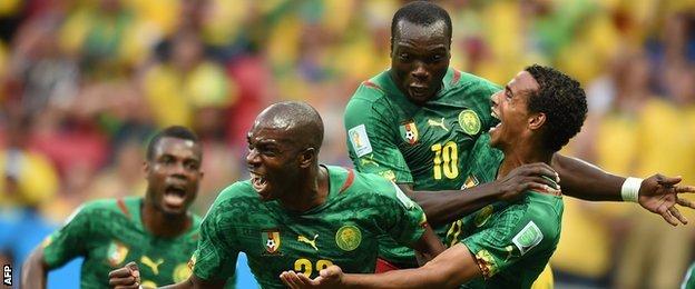 Joel Matip of Cameroon celebrates with his Cameroon team-mates