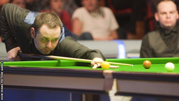 Stephen Maguire takes a shot