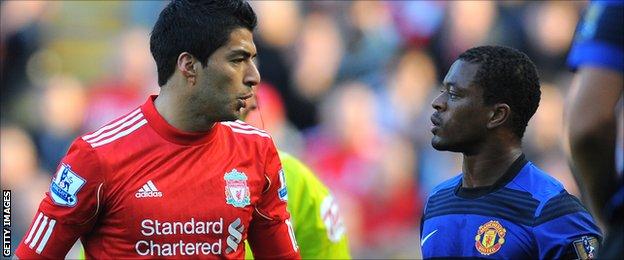 Luis Suarez and Patrice Evra