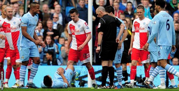 Joey Barton is sent off against Manchester City