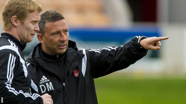 Aberdeen manager Derek McInnes with Barry Robson before the friendly with Arbroath