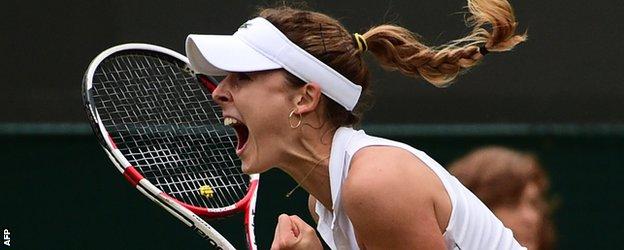 Alize Cornet celebrates beating Serena Williams at Wimbledon