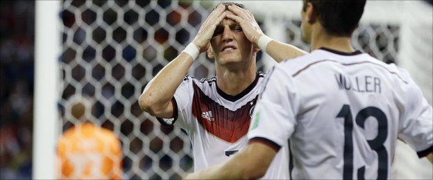 Bastian Schweinsteiger sees his header saved