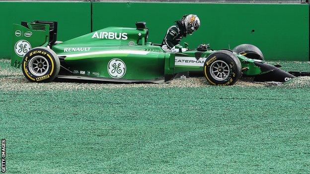 Caterham's Kamui Kobayashi and Williams' Felipe Massa come together and spin out into the gravel