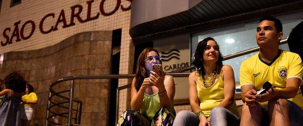 Brazil fans outside the hospital where Neymar is being treated