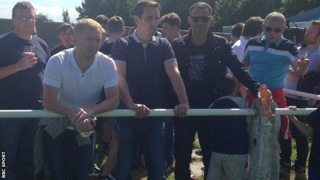 Paul Scholes, Gary Neville and Ryan Giggs watch Salford City
