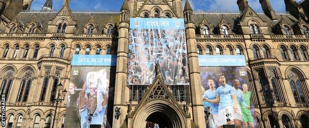 Manchester town hall is decked in City colours to celebrate the 2014 Premier League title win