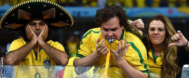 Dejected Brazil fans