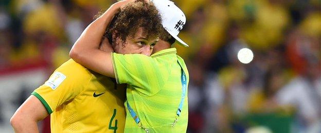 Suspended captain Thiago Silva consoles David Luiz