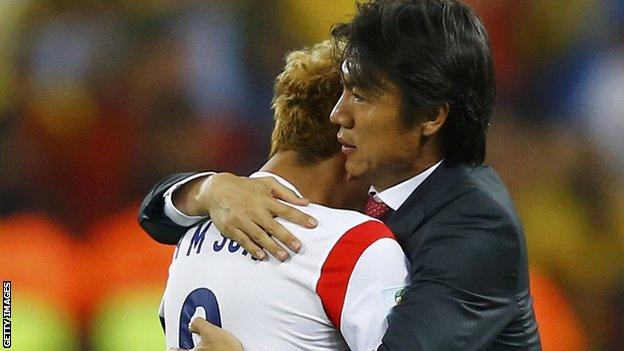 Hong Myung-bo of South Korea with player Son Heung-min