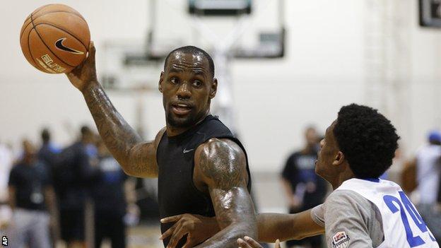 LeBron James returns to Cavs: 'I'm coming home'