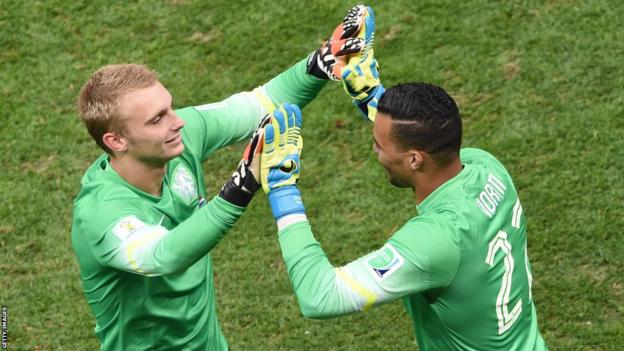 Swansea City and Netherlands goalkeeper Michel Vorm (right) makes his World Cup finals debut coming on for Jasper Cillessen against Brazil in the third place play-off