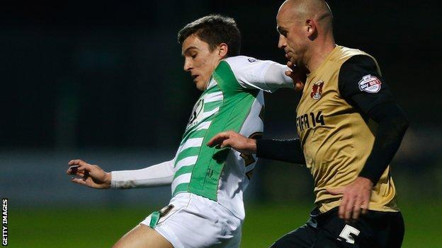 Adam Morgan (left) playing for Yeovil Town