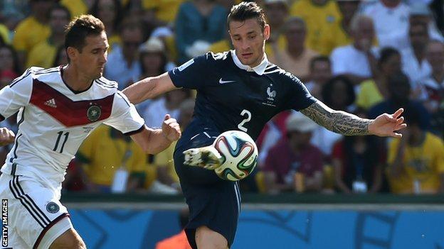 Mathieu Debuchy (right) in action for France at the World Cup
