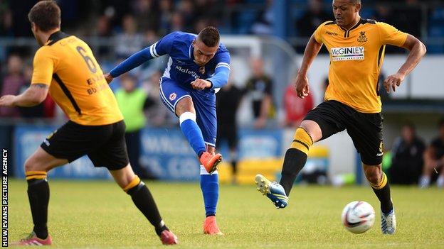 Federicho Macheda fires in a shot against Carmarthen Town
